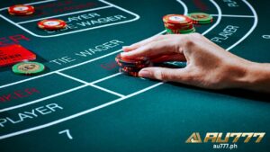 a hand betting on player side in baccarat table